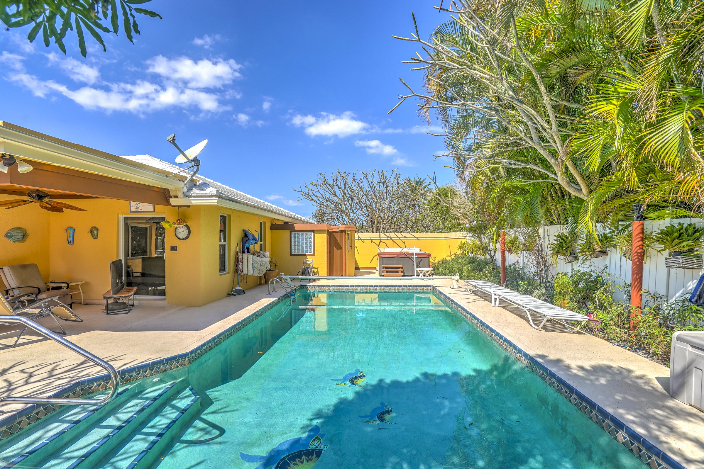 1191 Emerald Drive Singer Island, FL 33404 - Photo 44 of 60 a view of a patio with swimming pool