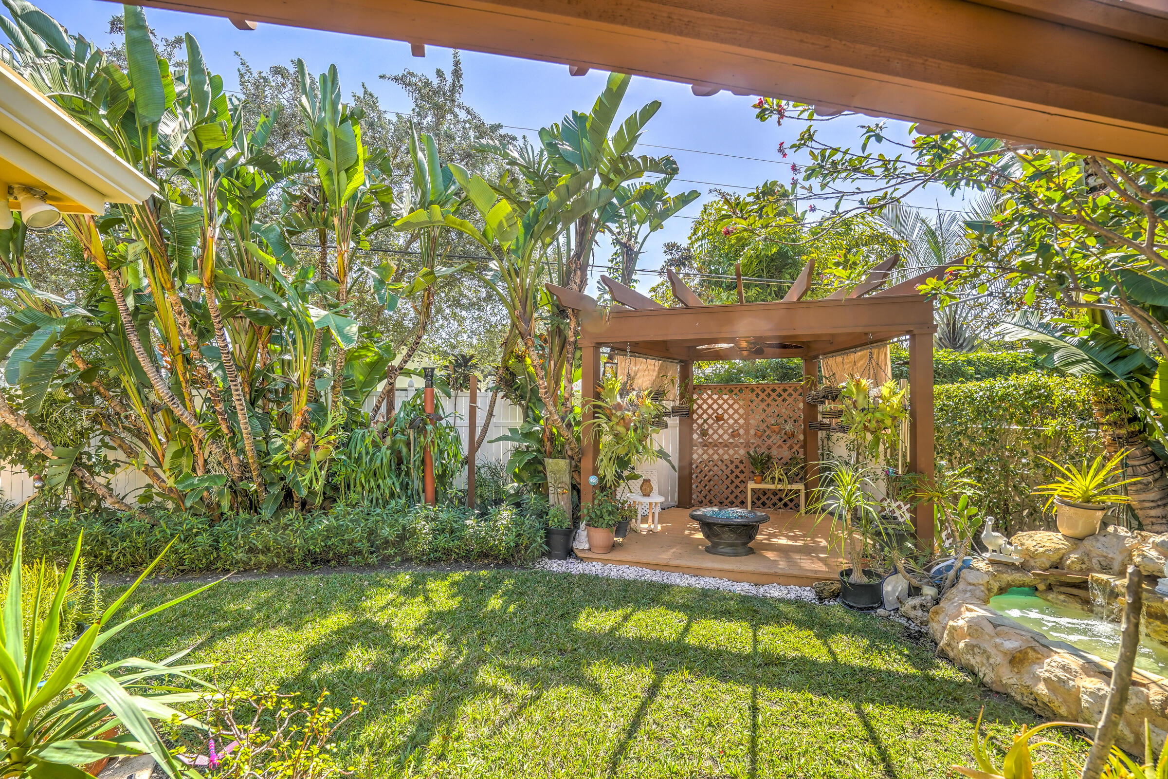 1191 Emerald Drive Singer Island, FL 33404 - Photo 49 of 60 a view of a swimming pool with a patio