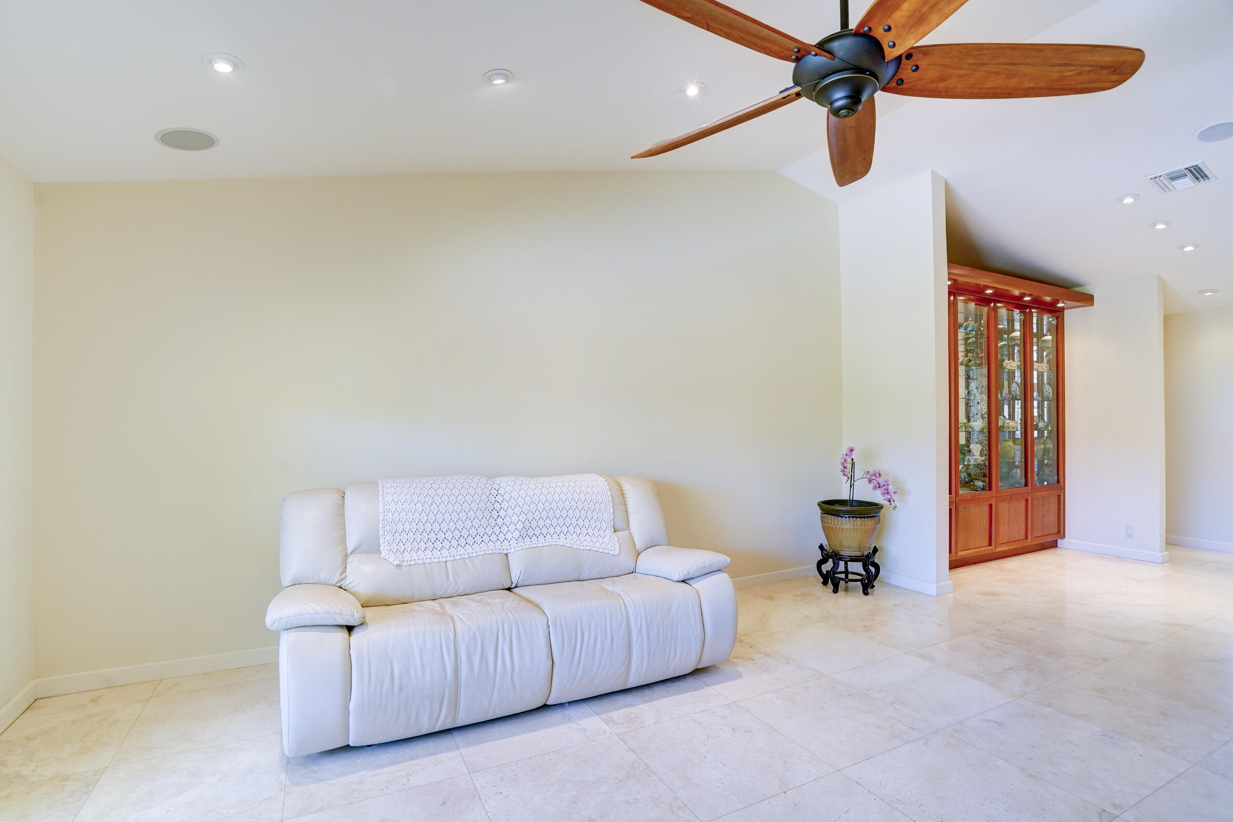 1191 Emerald Drive Singer Island, FL 33404 - Photo 10 of 60 a living room with furniture and a window