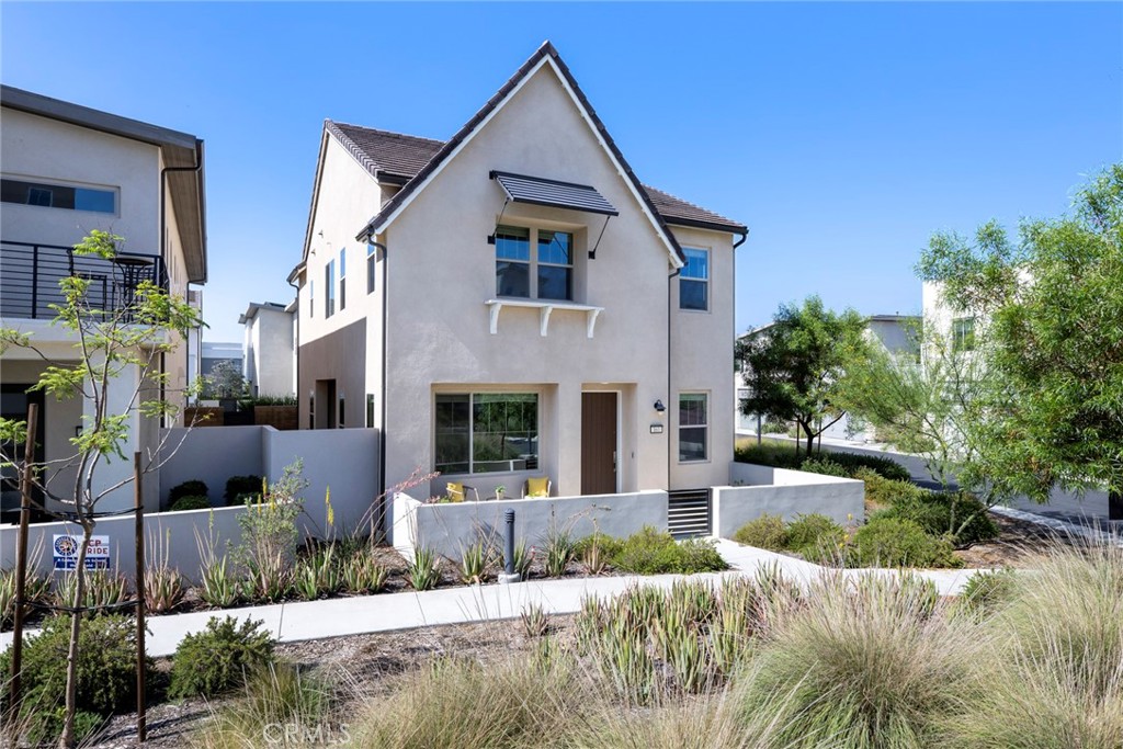 163 Scale Irvine, CA 92618 - Photo 1 of 1 a front view of house with yard