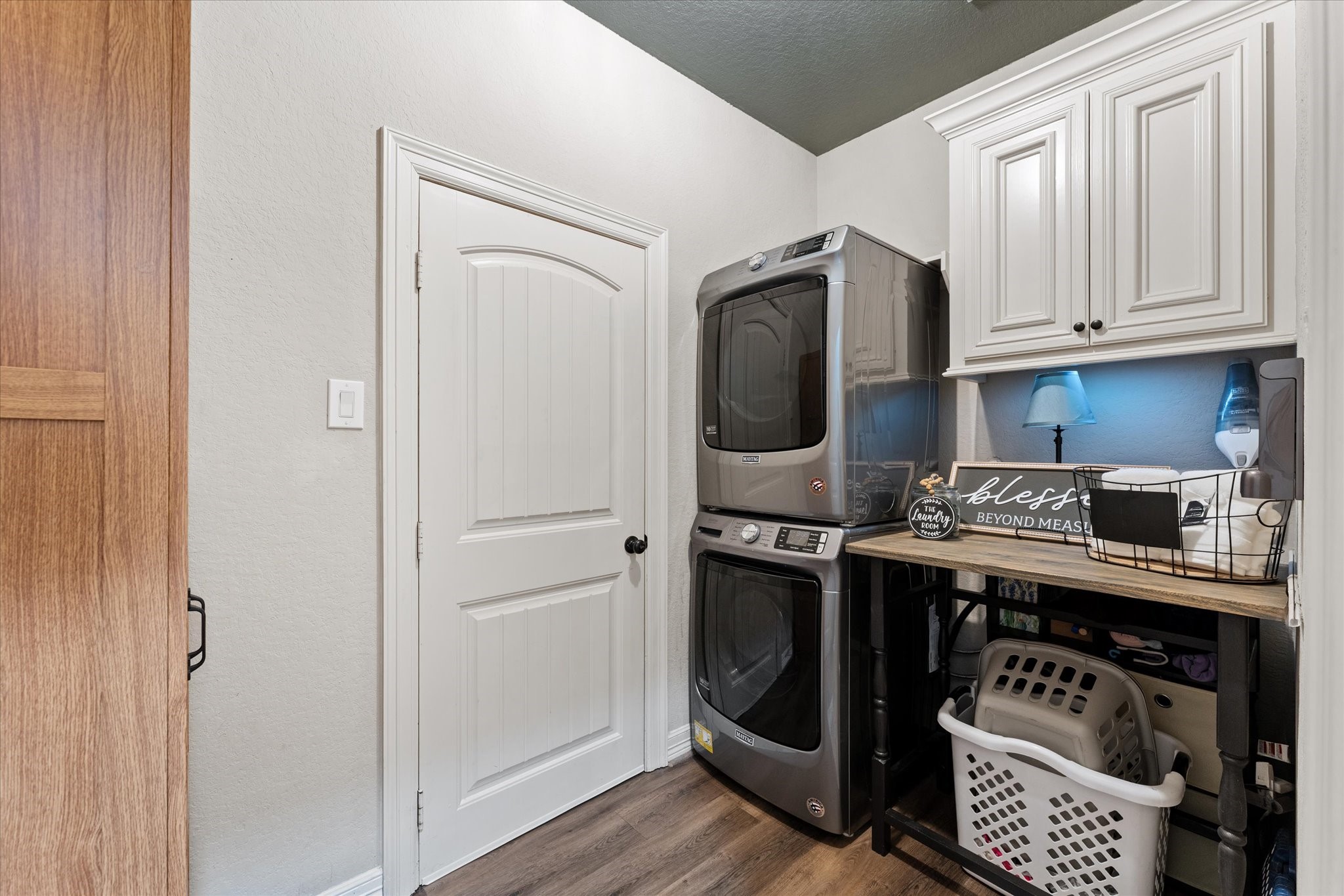 226 Capetown Conroe, TX 77356 - Photo 16 of 36 a kitchen with stainless steel appliances granite countertop a stove a refrigerator and a cabinets