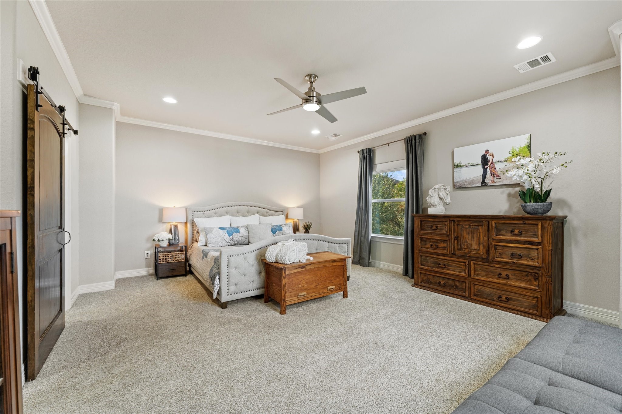 226 Capetown Conroe, TX 77356 - Photo 21 of 36 a bed room with a bed and a chair