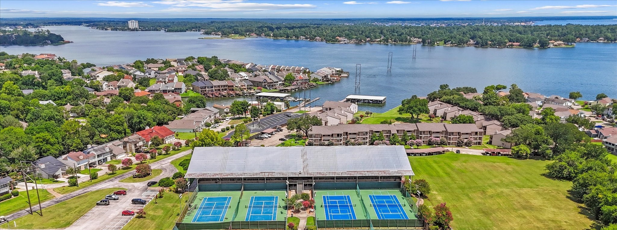 226 Capetown Conroe, TX 77356 - Photo 35 of 36 an aerial view of a house with a lake view