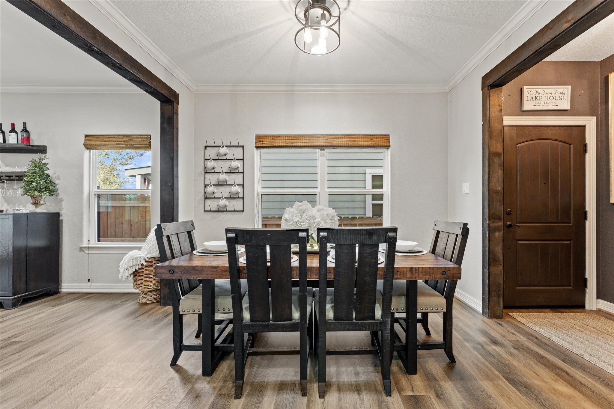 226 Capetown Conroe, TX 77356 - Photo 6 of 36 a view of a dining room with furniture window and wooden floor
