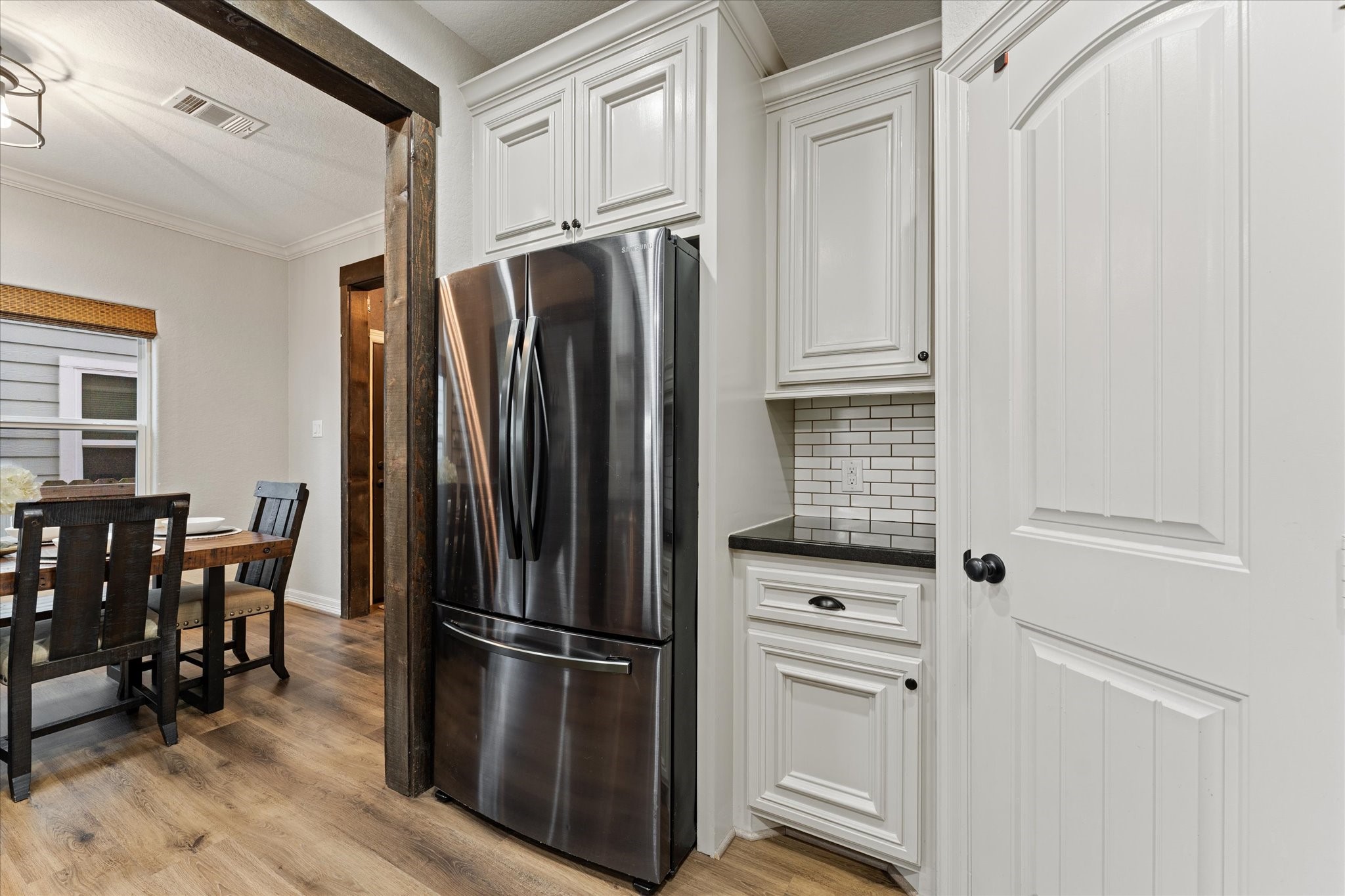 226 Capetown Conroe, TX 77356 - Photo 8 of 36 a kitchen with stainless steel appliances a refrigerator stove and microwave