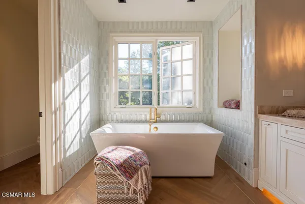 a room with a bed and a window