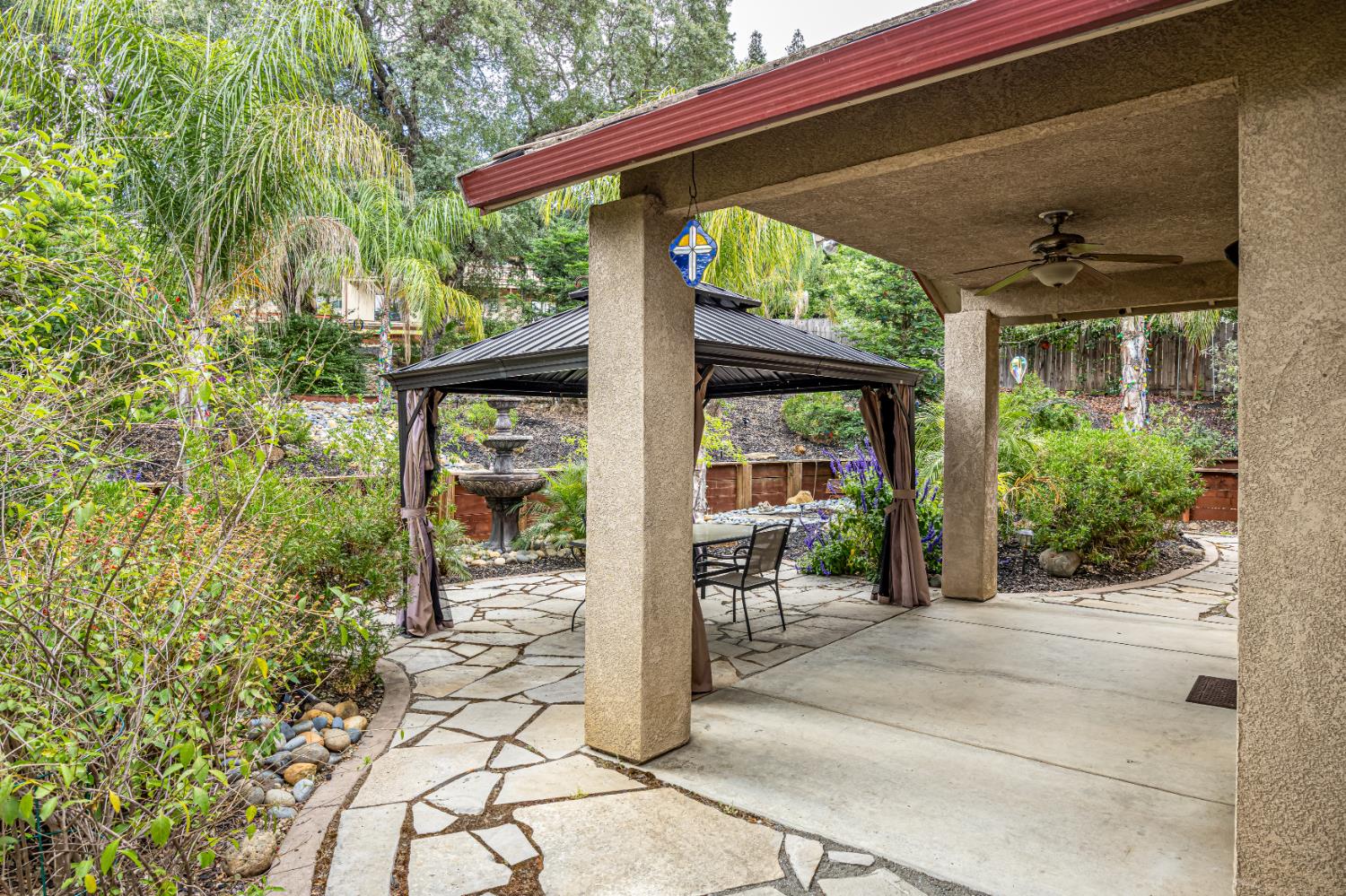 2083 State Rte 26 Valley Springs, CA 95252 - Photo 31 of 59 a porch with seating space and hardwood floor