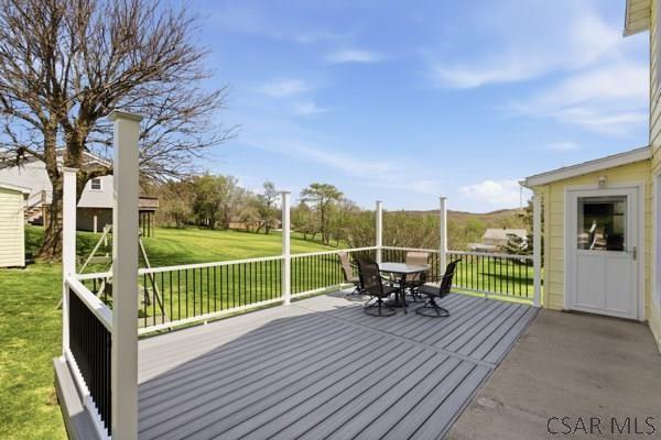 66 Gdula Street Windber, PA 15963 - Photo 2 of 23 a view of a two chair and table in the balcony