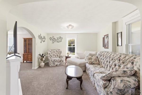 66 Gdula Street Windber, PA 15963 - Photo 6 of 23 a living room with furniture and a large mirror