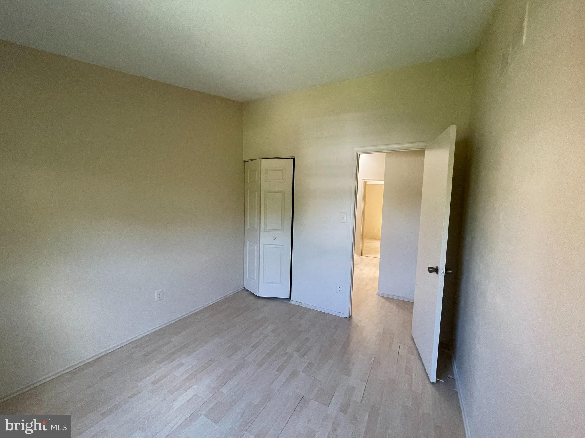7267 Brookfalls Terrace Baltimore, MD 21209 - Photo 15 of 29 wooden floor in an empty room