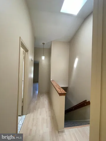 a view of hallway with stairs