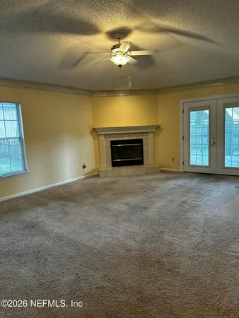 a view of a livingroom with a fireplace