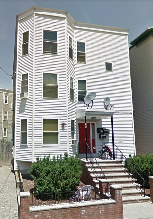 a view of a house with a porch
