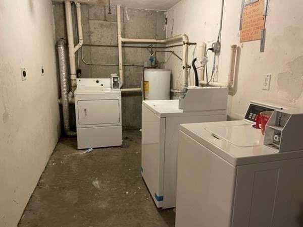 366 Centre Street Boston, MA 02122 - Photo 8 of 14 a utility room with dryer and washer