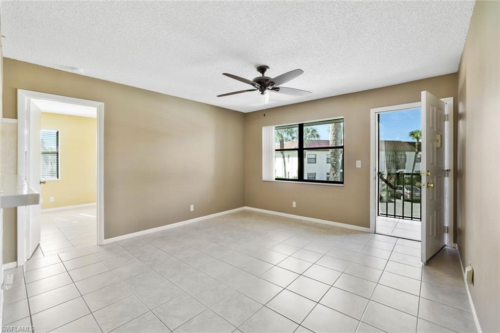 4345 27th Court Southwest, Unit 204 Naples, FL 34116 - Photo 4 of 25 a view of an empty room with a window