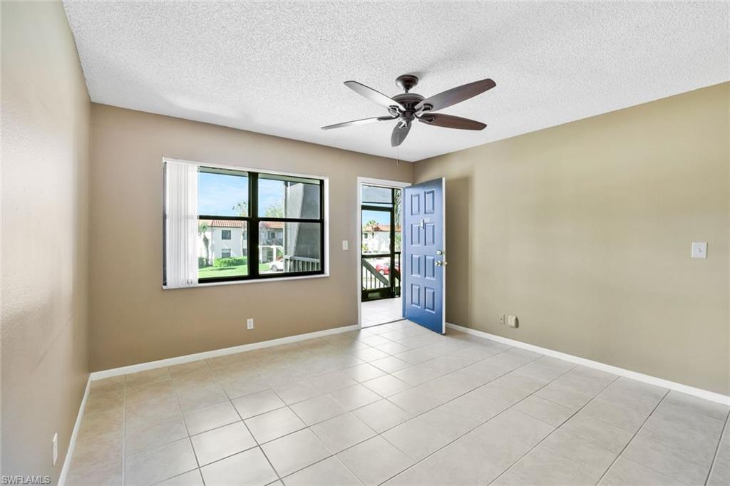 4345 27th Court Southwest, Unit 204 Naples, FL 34116 - Photo 5 of 25 a view of an empty room with a window