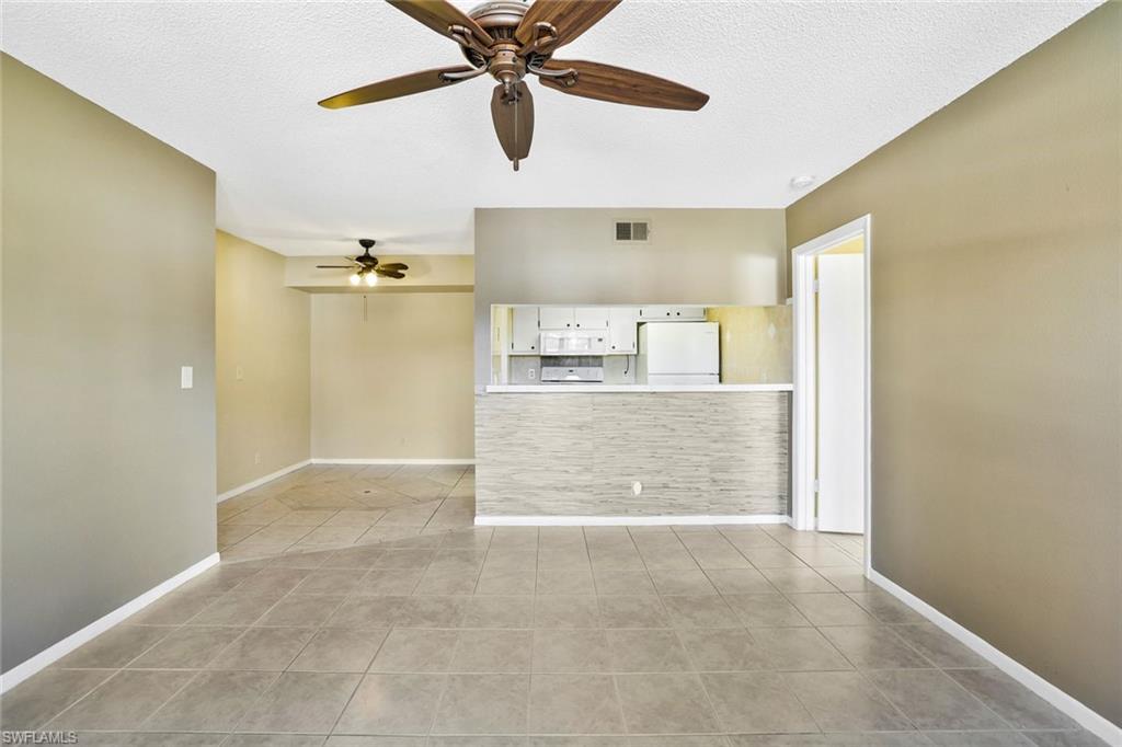 4345 27th Court Southwest, Unit 204 Naples, FL 34116 - Photo 7 of 25 a view interior of a house and natural light