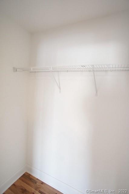 15 Arch Street, Unit B8 Norwalk, CT 06850 - Photo 4 of 10 a view of a room with racks on the wall