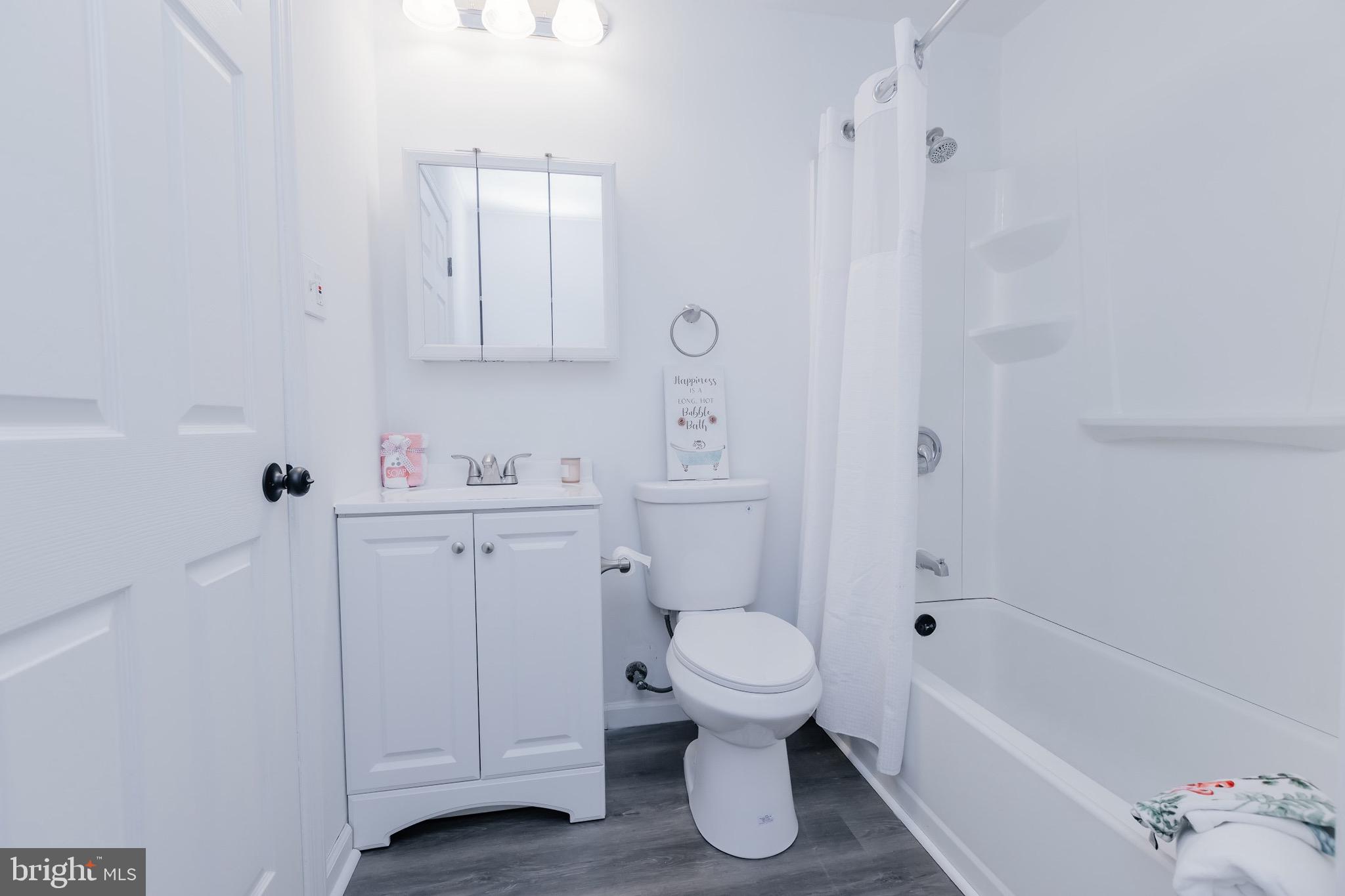21 Velvet Lane Levittown, PA 19054 - Photo 22 of 47 a bathroom with a sink toilet vanity and bathtub