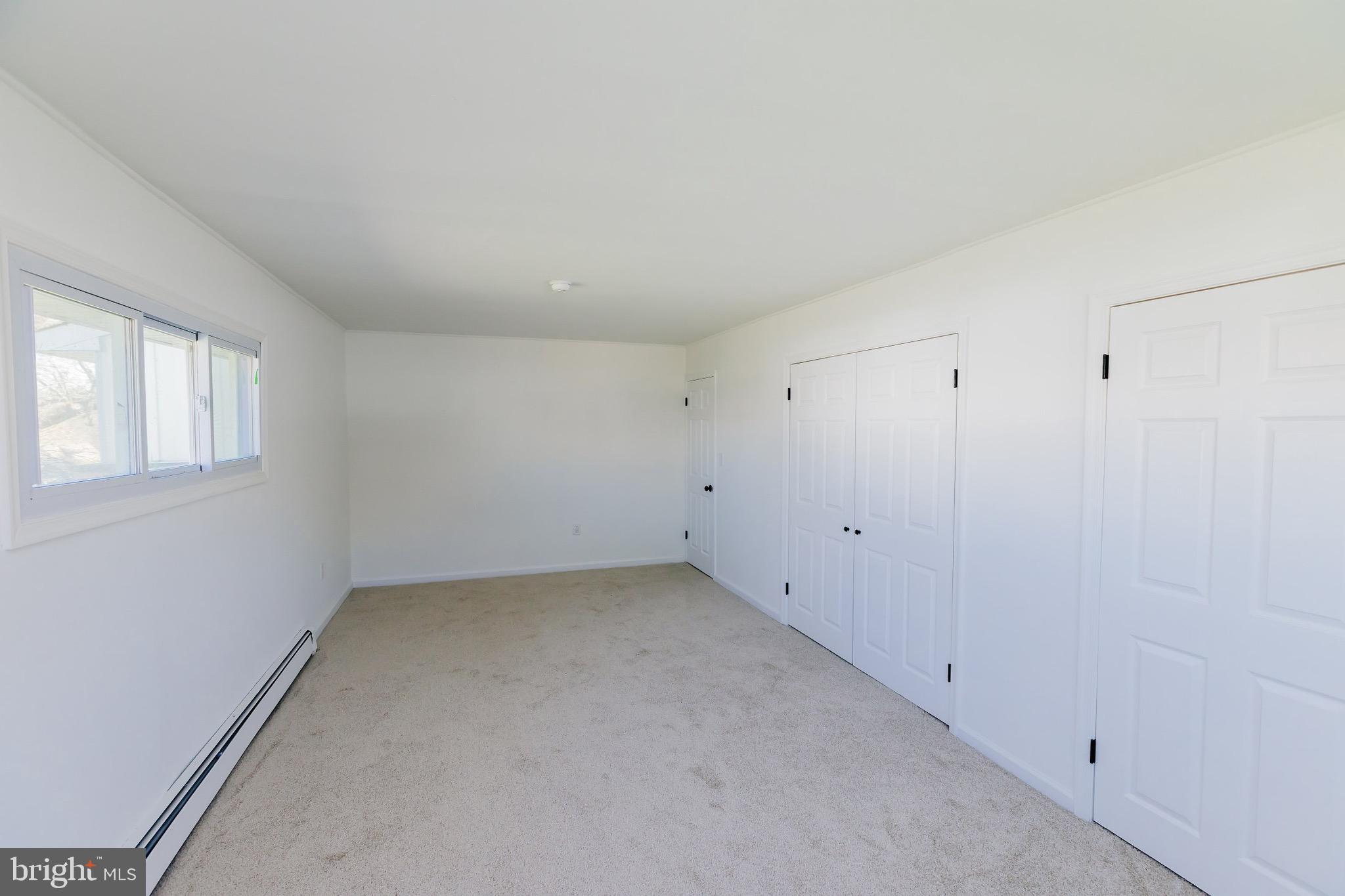 21 Velvet Lane Levittown, PA 19054 - Photo 27 of 47 a view of an empty room with a window