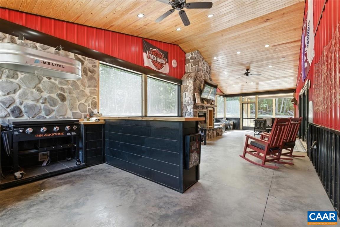 1568 Bent Creek Road Concord, VA 24538 - Photo 34 of 75 a outdoor space with the couches and a fireplace