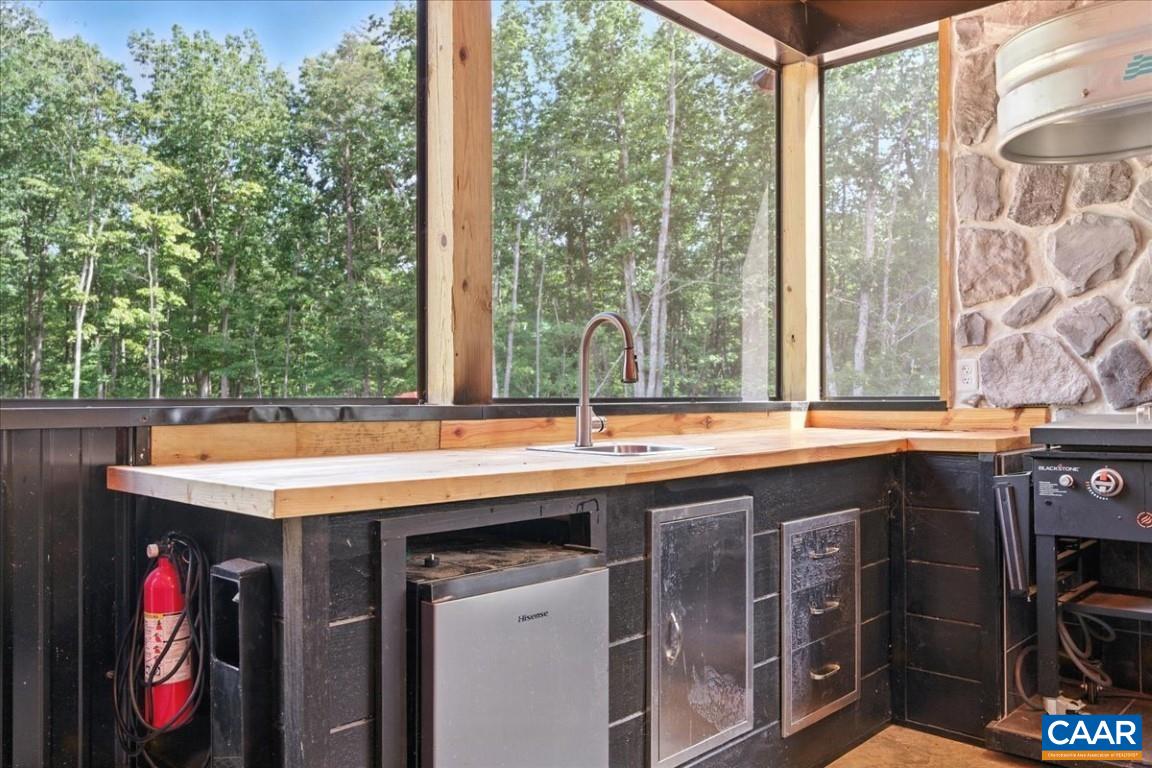 1568 Bent Creek Road Concord, VA 24538 - Photo 36 of 75 a utility room with a sink and a large window