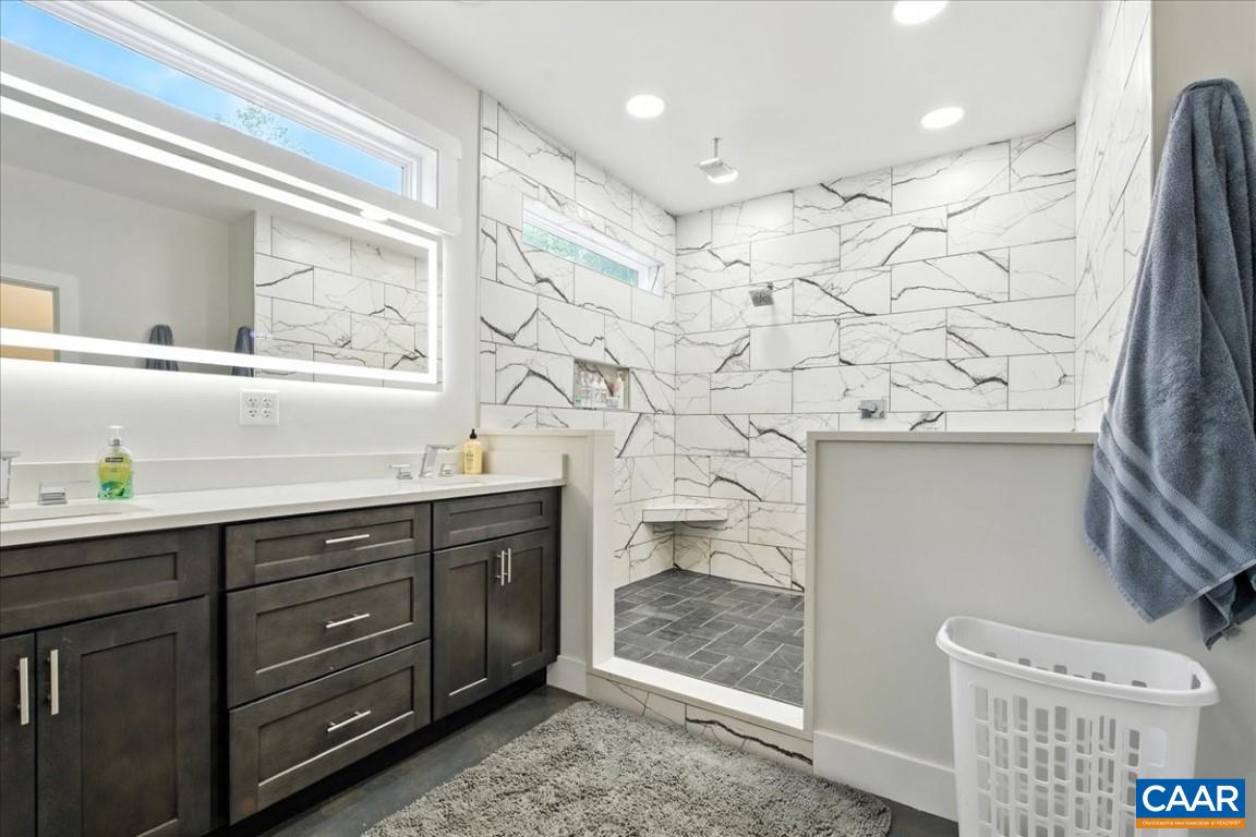 1568 Bent Creek Road Concord, VA 24538 - Photo 46 of 75 a bathroom with a sink toilet and shower