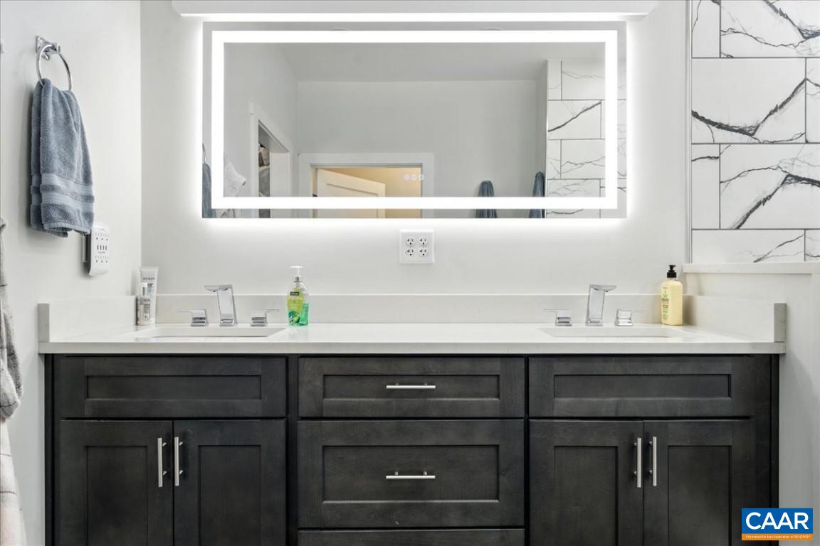 1568 Bent Creek Road Concord, VA 24538 - Photo 49 of 75 a bathroom with a sink and a mirror