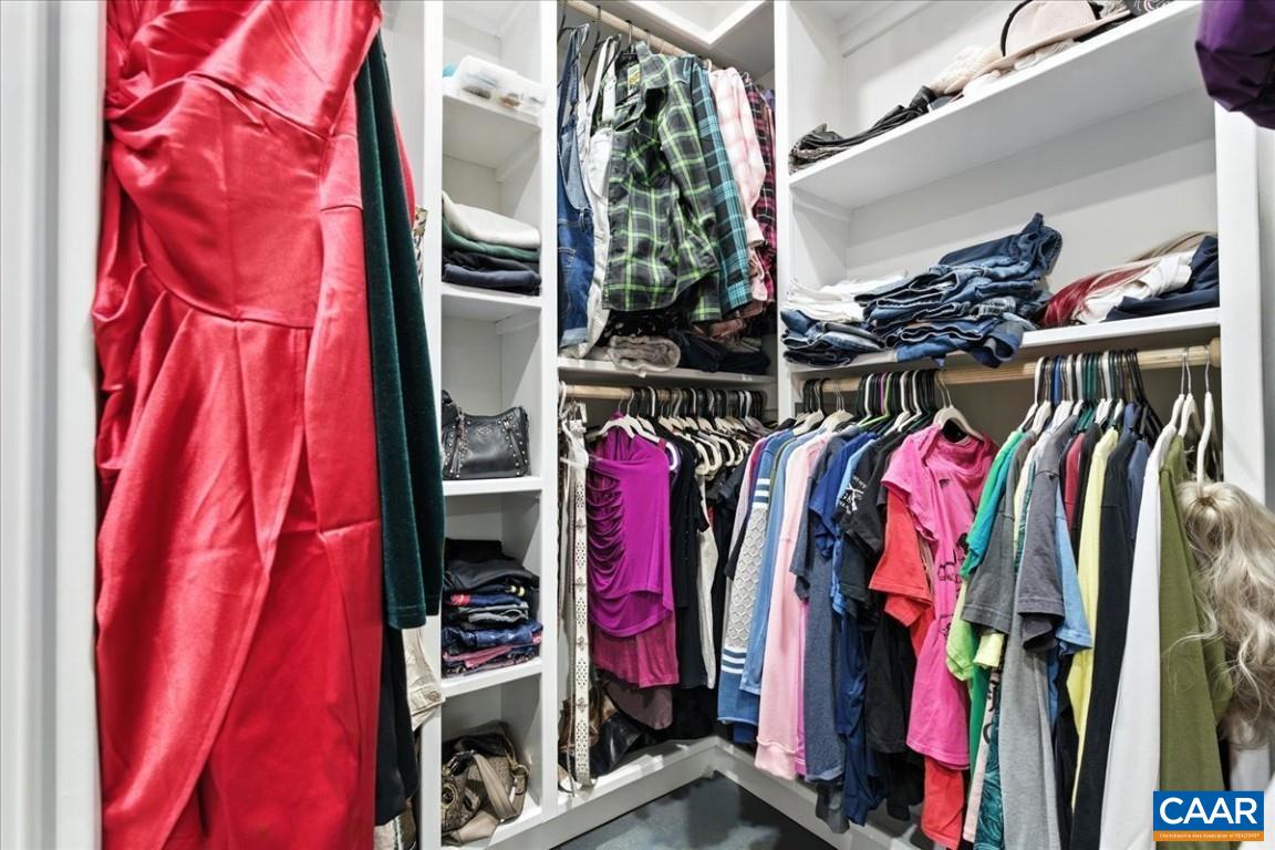 1568 Bent Creek Road Concord, VA 24538 - Photo 51 of 75 a view of walk in closet with clothes