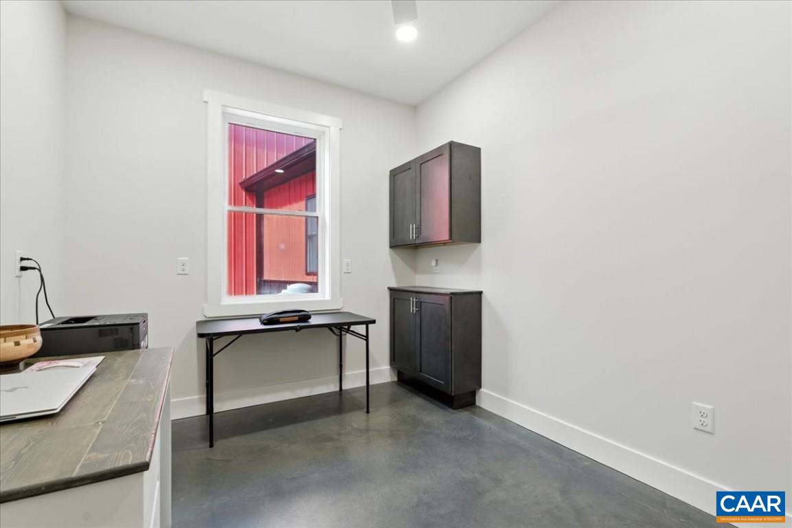 1568 Bent Creek Road Concord, VA 24538 - Photo 58 of 75 a kitchen with granite countertop a sink and a stove top oven