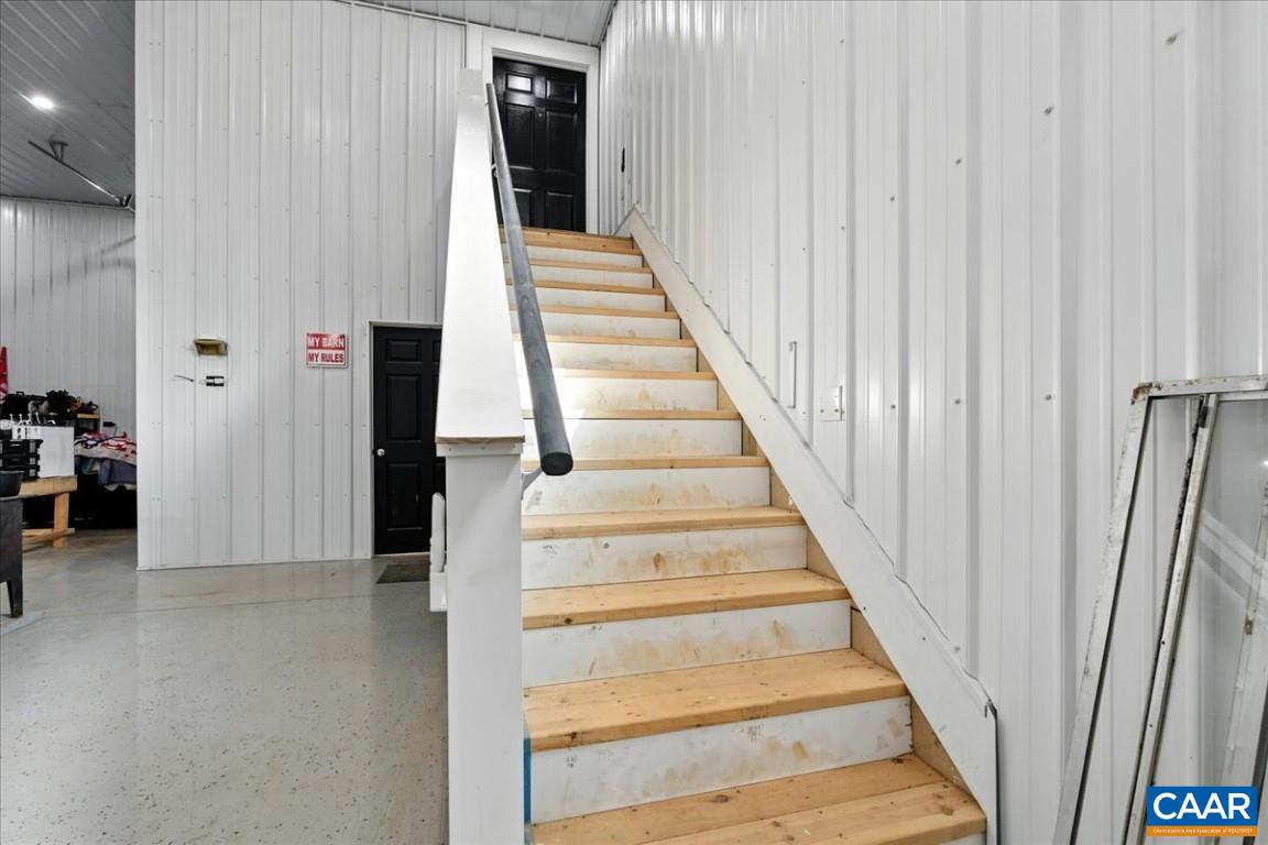 1568 Bent Creek Road Concord, VA 24538 - Photo 68 of 75 a view of a hallway with wooden floor and entryway