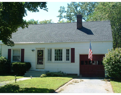 74 Bither Street Springfield, MA 01118 - Photo 4 of 22 a front view of a house with a yard
