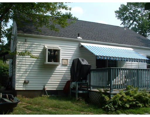 74 Bither Street Springfield, MA 01118 - Photo 5 of 22 a view of a house with a yard