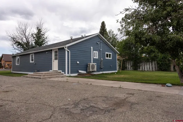a view of a tiny house with a park
