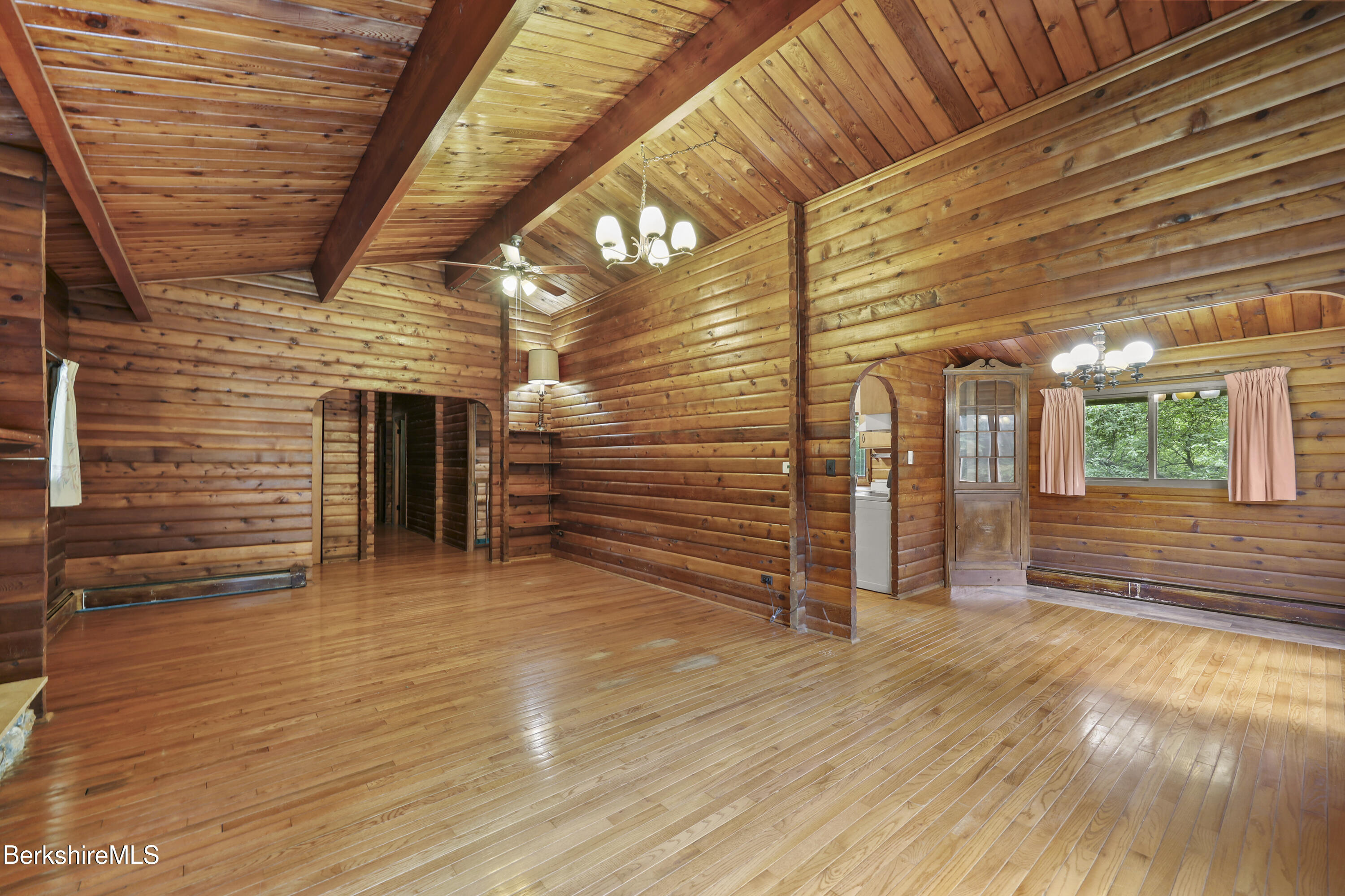 240 Kirchner Road Dalton, MA 01226 - Photo 16 of 51 a view of an empty room with wooden floor and stairs