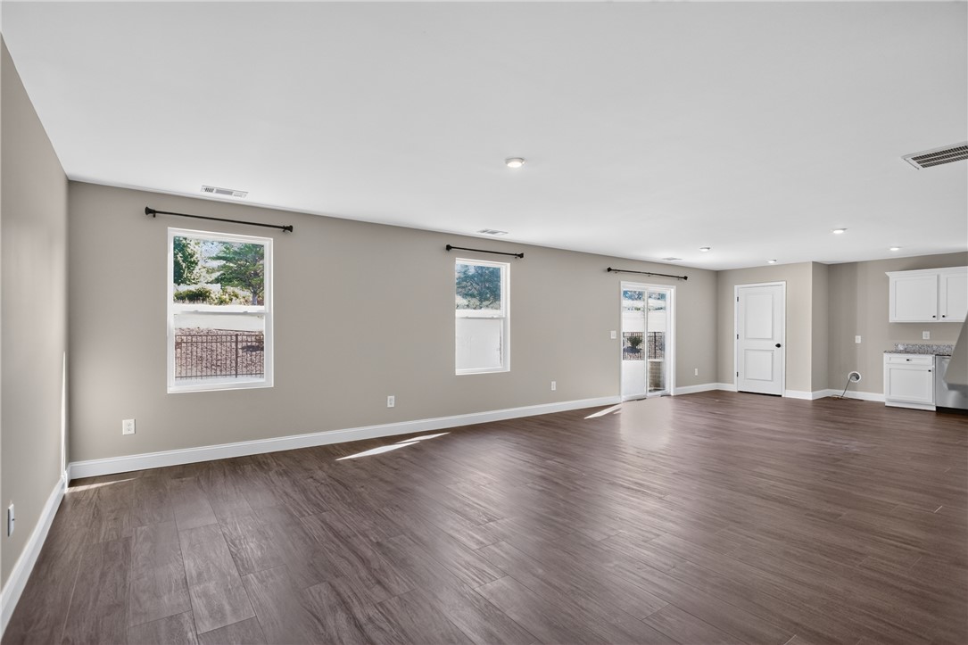 2007 Aberdeen Lane Walhalla, SC 29691 - Photo 9 of 41 Bright, open-concept space featuring rich wood flooring and abundant natural light.