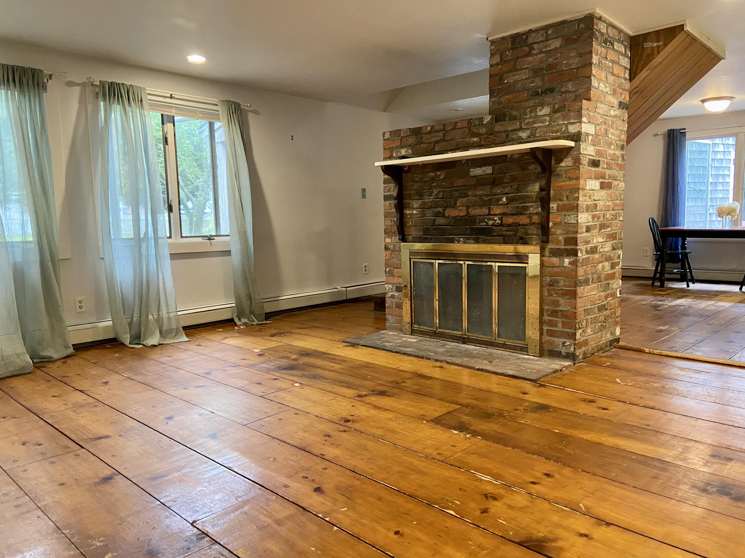 43 Bay Road Harwich, MA 02645 - Photo 14 of 24 a view of empty room with wooden floor and fan