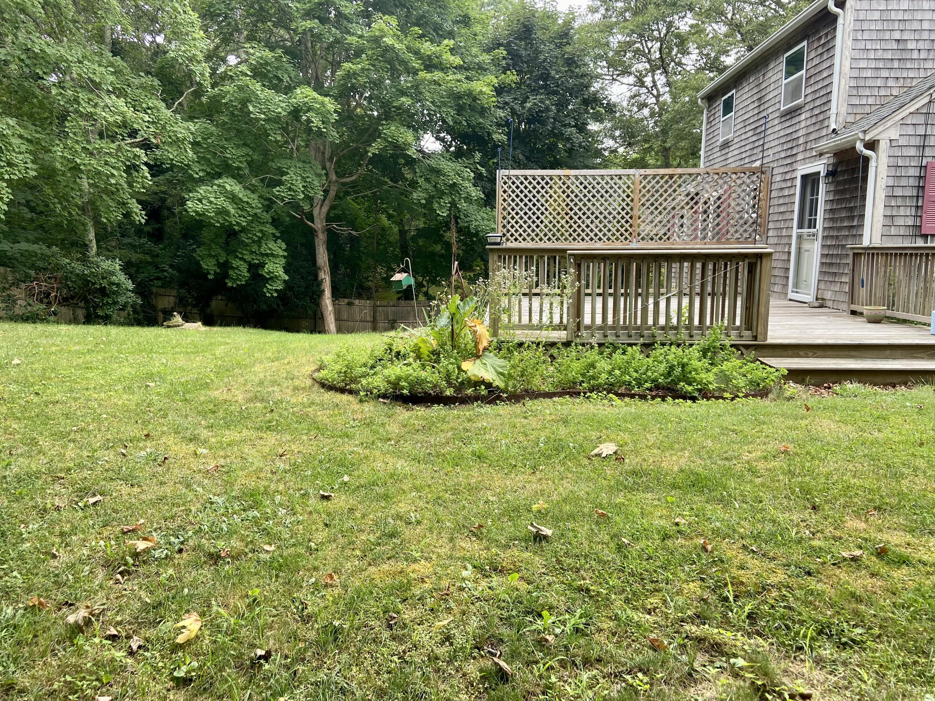 43 Bay Road Harwich, MA 02645 - Photo 19 of 24 a view of a house with garden and deck