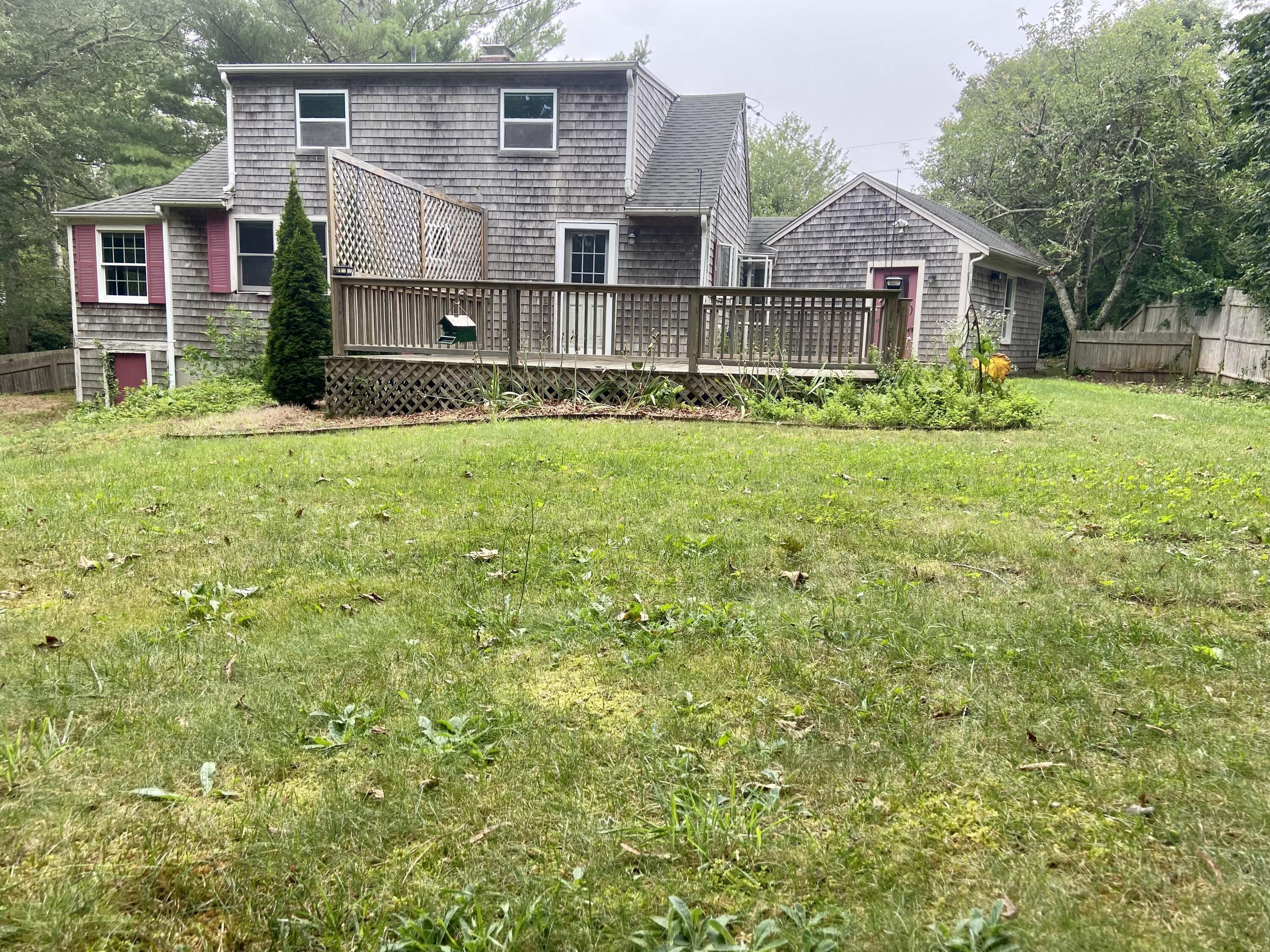 43 Bay Road Harwich, MA 02645 - Photo 24 of 24 front view of a house with a yard