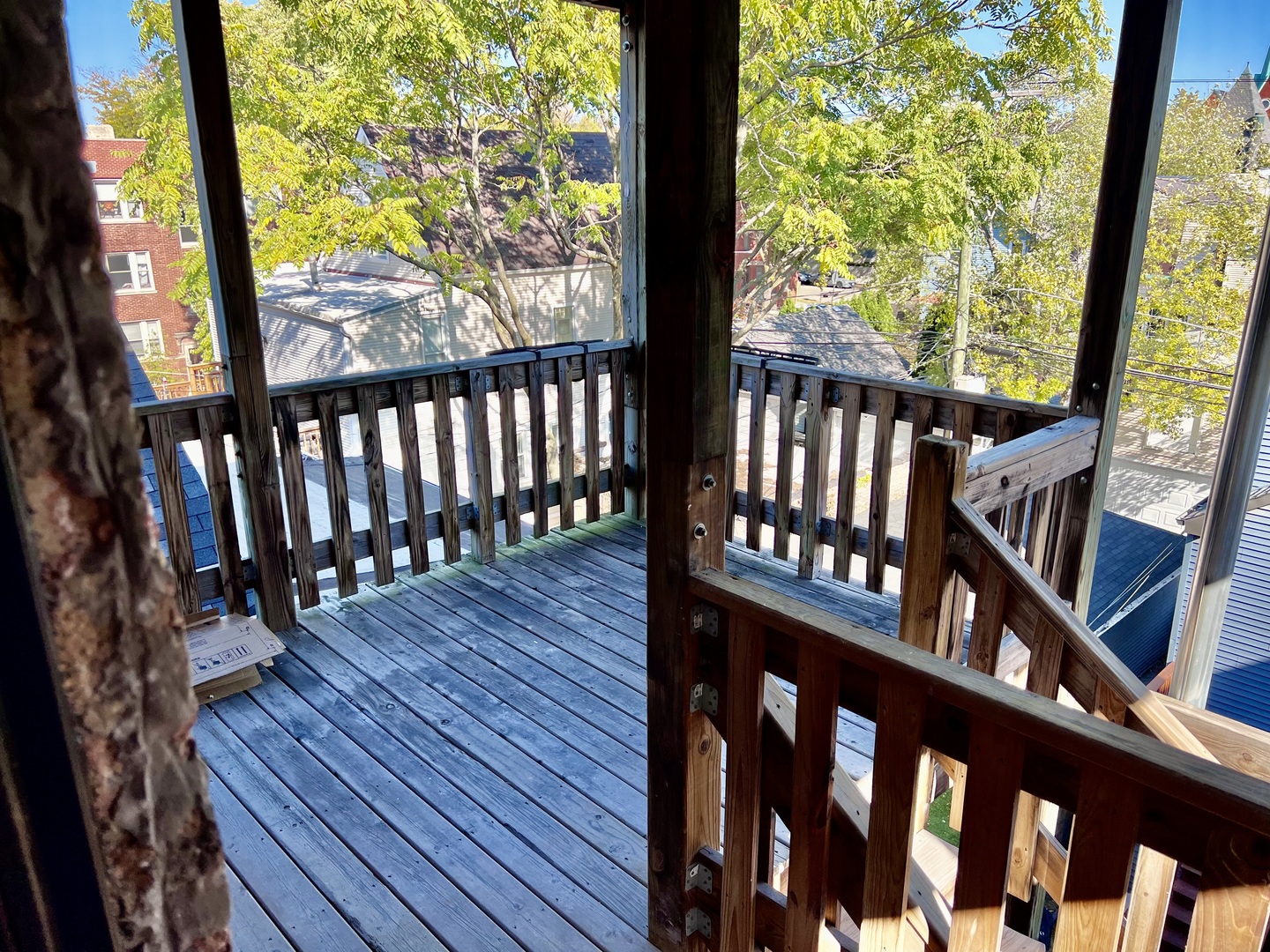 3051 North Racine Avenue, Unit 3F Chicago, IL 60657 - Photo 21 of 21 a view of wooden porch with a bench