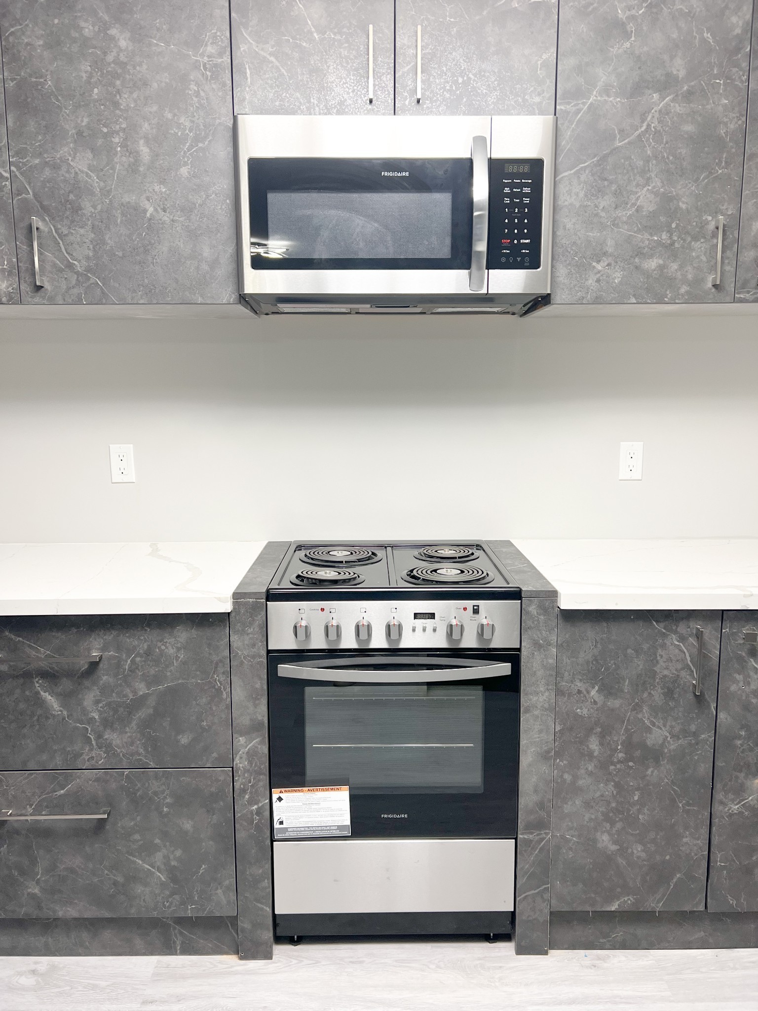 543 Peachers Mill Road, Unit 209 Clarksville, TN 37042 - Photo 7 of 21 a stove top oven sitting inside of a kitchen