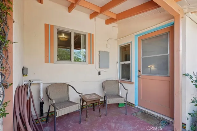 a workspace with furniture and window