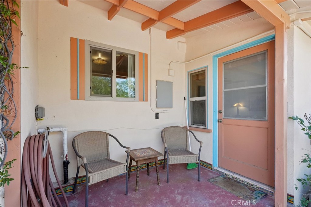 61494 Sunburst Drive Joshua Tree, CA 92252 - Photo 20 of 31 a workspace with furniture and window