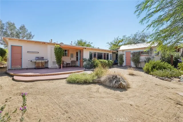 a view of a house with a patio
