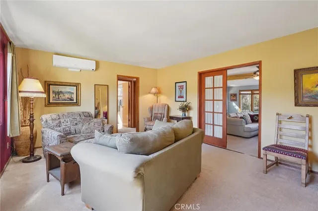 a living room with furniture and a couch