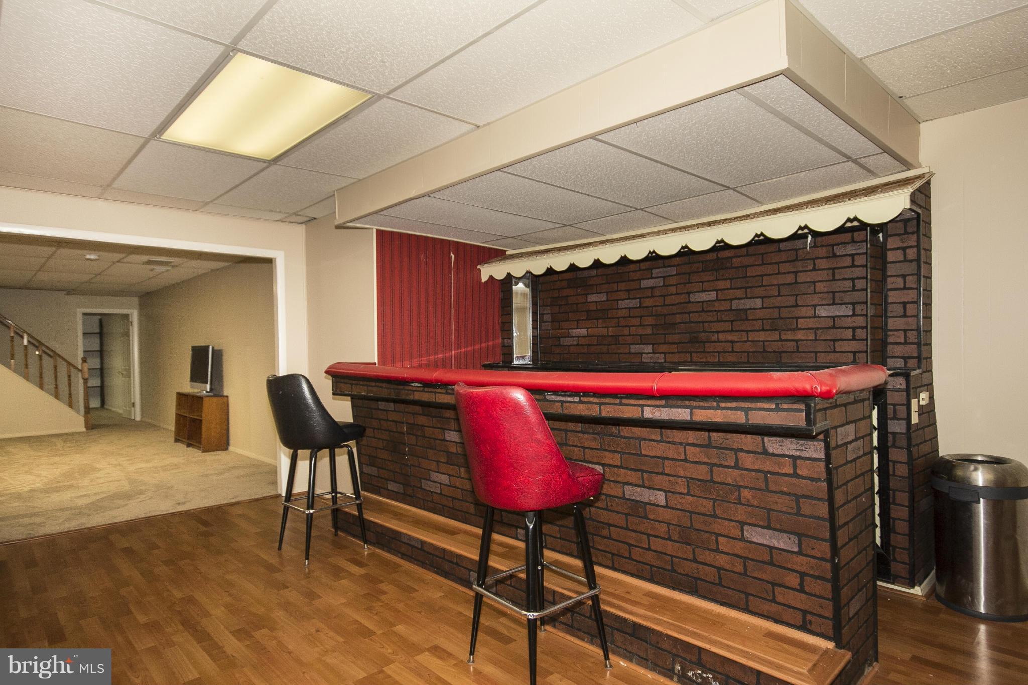 4202 Holbrook Road Randallstown, MD 21133 - Photo 22 of 30 Built in Bar, view toward TV room