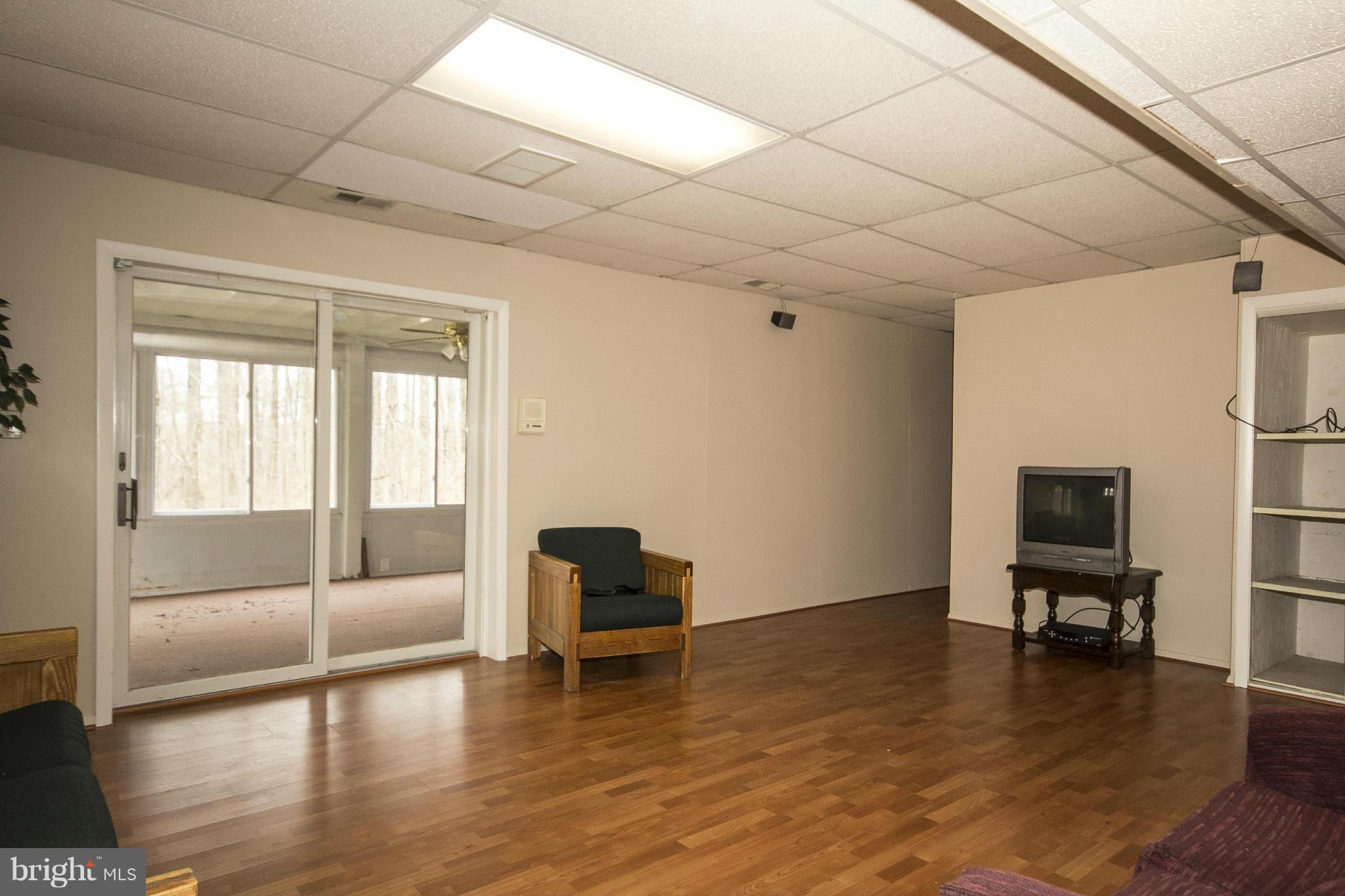 4202 Holbrook Road Randallstown, MD 21133 - Photo 23 of 30 Basement Game Room, view toward Florida Rm.