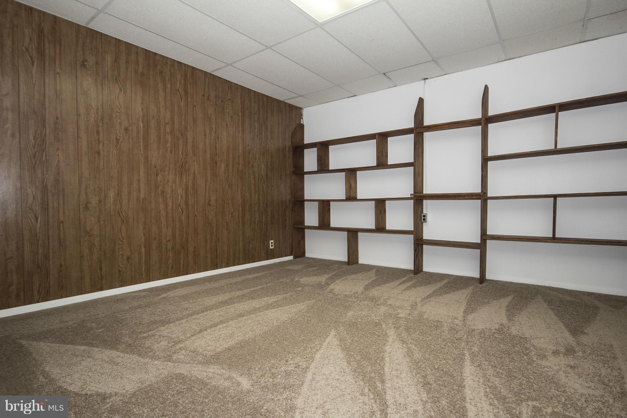 4202 Holbrook Road Randallstown, MD 21133 - Photo 24 of 30 Basement Den with built in shelving