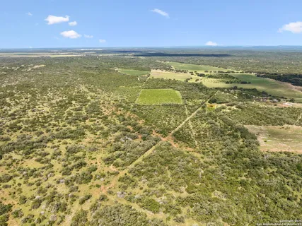 a view of a yard with an outdoor space