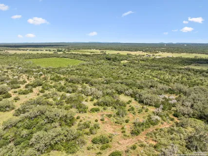 a view of a field with an outdoor space